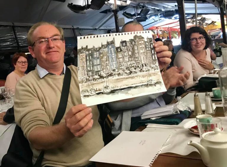 Pierre holds up Janet's drawing 2019